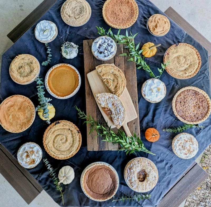 a table decorated with pies