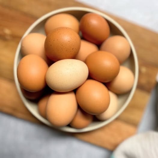Fresh eggs in a bowl from Dutch Country Farm Market.